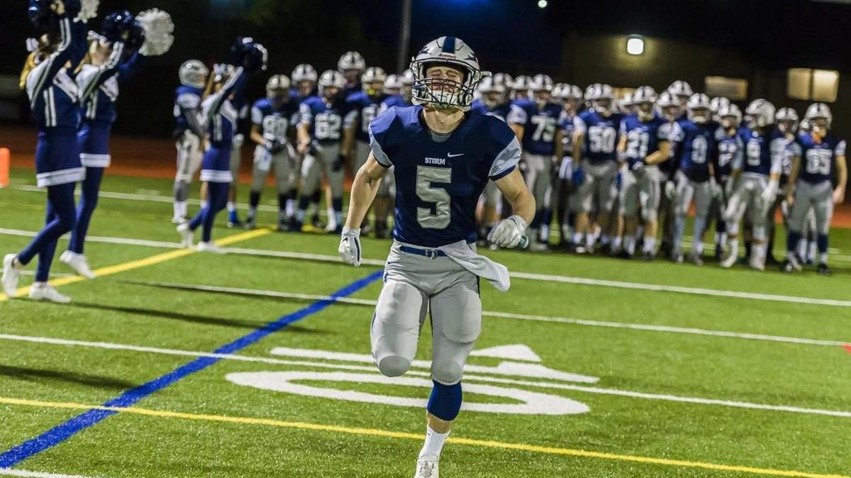 Squalicum’s Ben Peterson (5) leads the squad onto the field prior to its Class 3A state playoff game against Bonney Lake Nov. 11 at Civic Stadium in Bellingham.