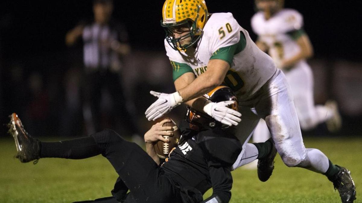 Lynden’s Jensen Mayberry tackles Blaine’s Jalen Kortlever Oct. 30 at Blaine. Mayberry announced that he has signed to play football at Olivet Nazarene University.