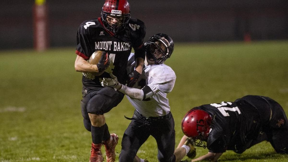 Mount Baker junior Jed Schleimer runs for a first down during the fourth quarter of a game against Meridian Oct. 23.