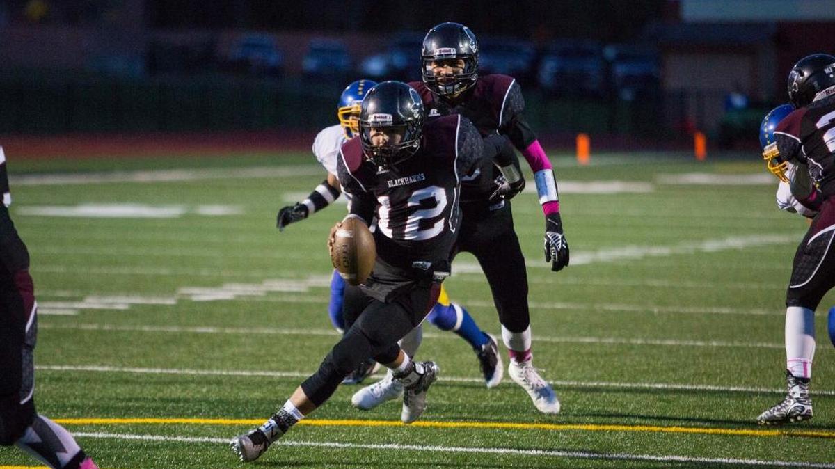 Lummi’s Jonathan Casimir runs the ball against Crescent on Friday, Oct. 9, at Lummi Nation school. The Blackhawks play Almira-Coulee-Harltine on Friday, Dec. 4, at the Tacoma Dome for the Class 1B State Football Championship.