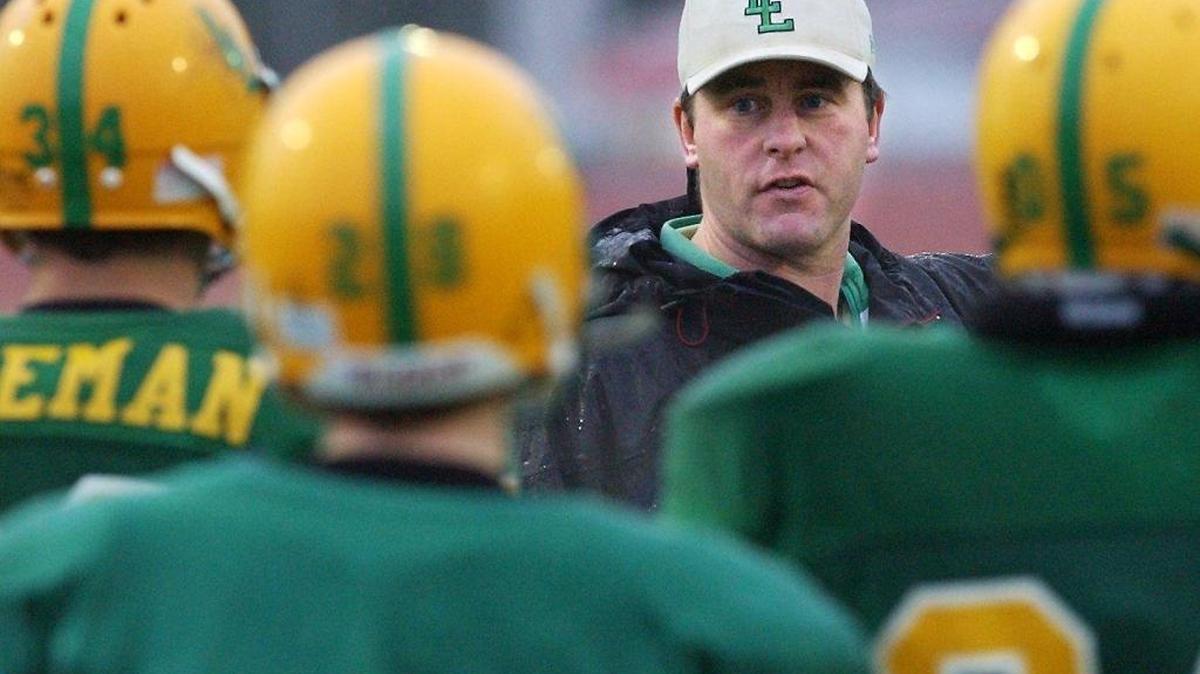 Lynden football coach Curt Kramme speaks to his team during a 2005 practice session. Kramme will be inducted into the Washington State Coaches Association Football Hall of Fame Jan. 28.