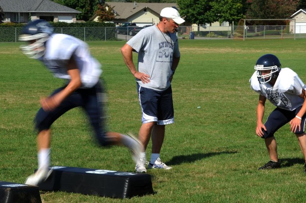 Lynden Christian coach Dan Kaemingk watches his team practice in August 2009.