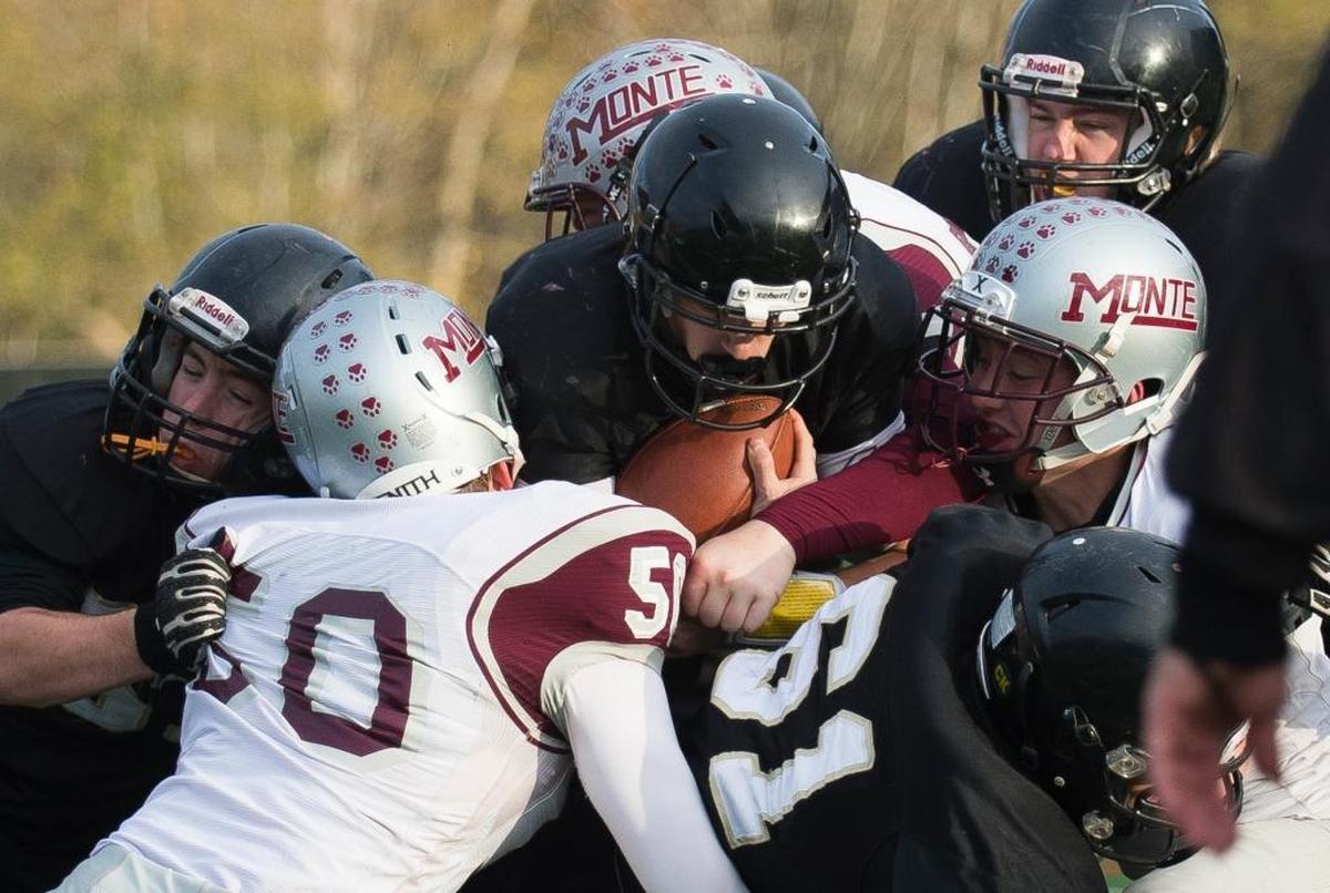 Meridian’s Simon Burkett plows into the end zone on fourth down for a touchdown against Montesano in the Class 1A state quarterfinals Saturday, Nov. 18, at Civic Stadium Bellingham. Meridian won 28-7.