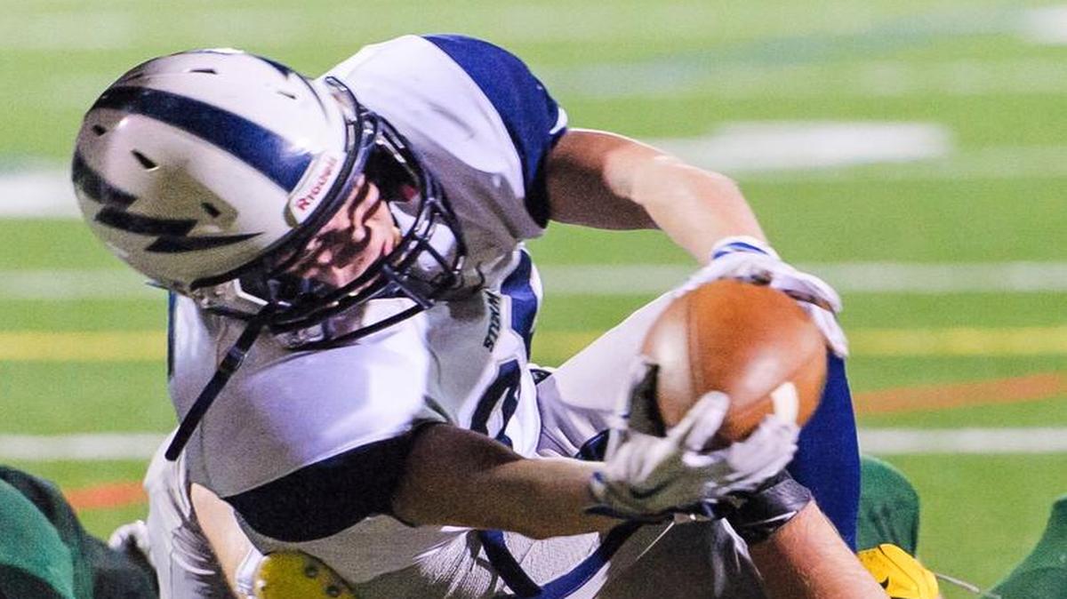 Squalicum running back Triston Smith is stopped short of the goal line by Sehome’s Briley Funk on Friday, Oct. 16, at Civic Field.