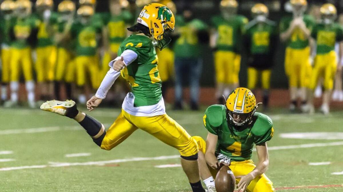 Lynden kicker Marko Samoukovic kicks an extra point during the first quarter of the the 2A Northwest district playoff game at Civic Stadium on Friday, Nov. 2.
