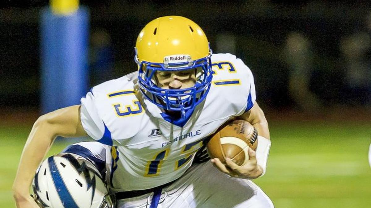 Ferndale quarterback James Hinson fights for yardage against Squalicum Oct. 10 at Civic Stadium.