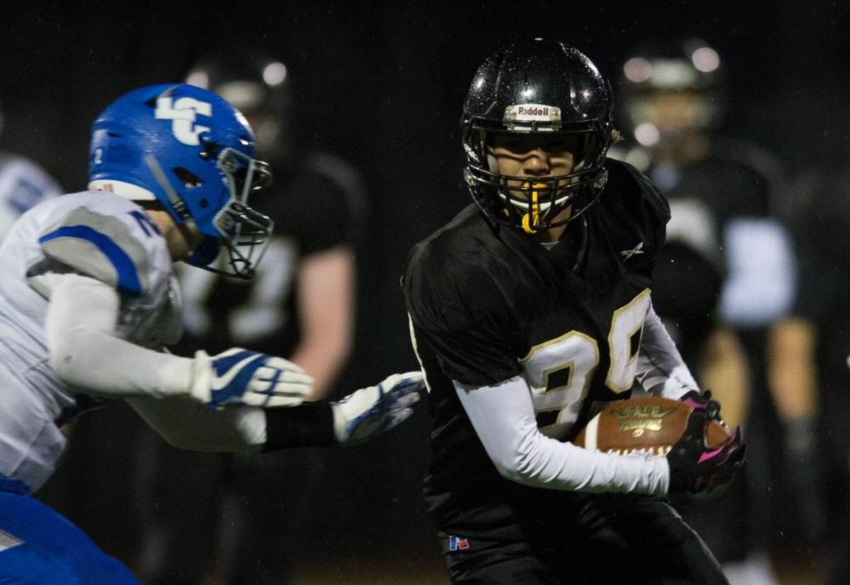Meridian’s Kevin Galiano runs with the ball during a 34-14 state semifinal victory over La Center on Nov. 25 at Civic Stadium in Bellingham.