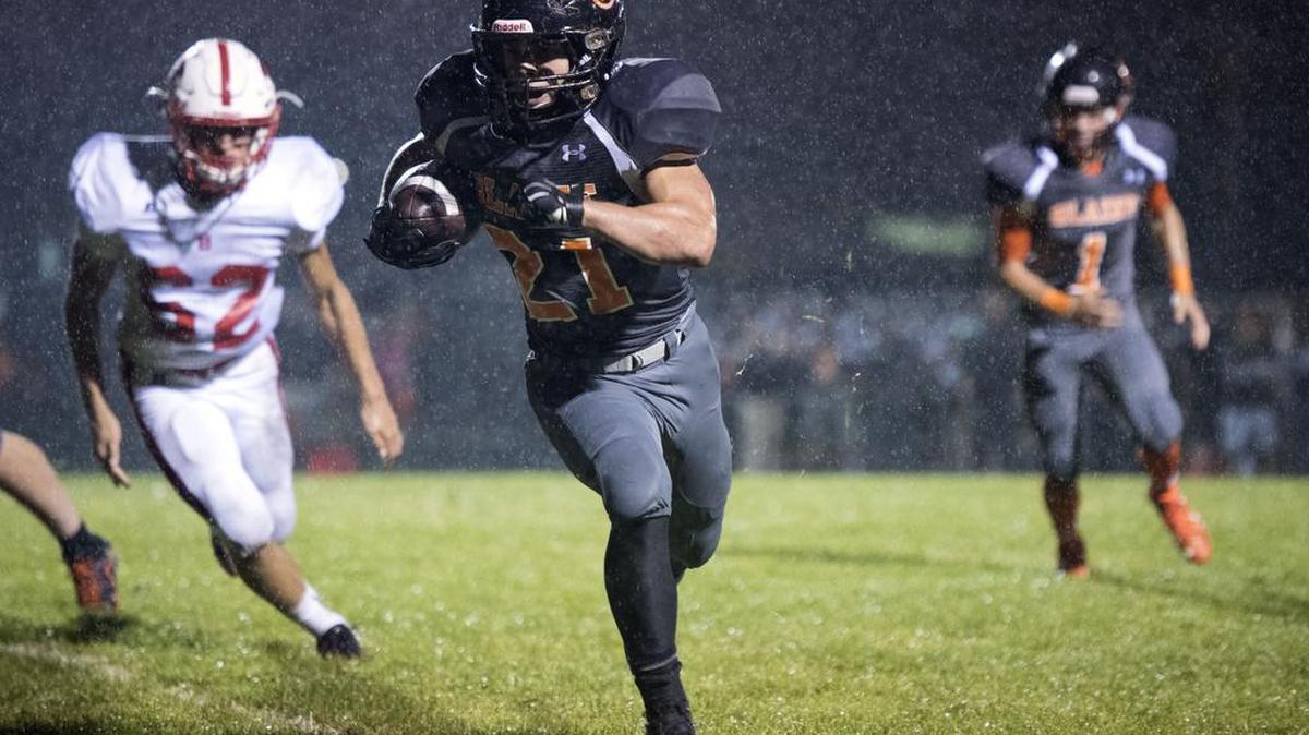Blaine running back Riley Fritsch turns the corner as he heads for the end zone to score the winning touchdown in the fourth quarter on Friday, Sept. 23, in Blaine.
