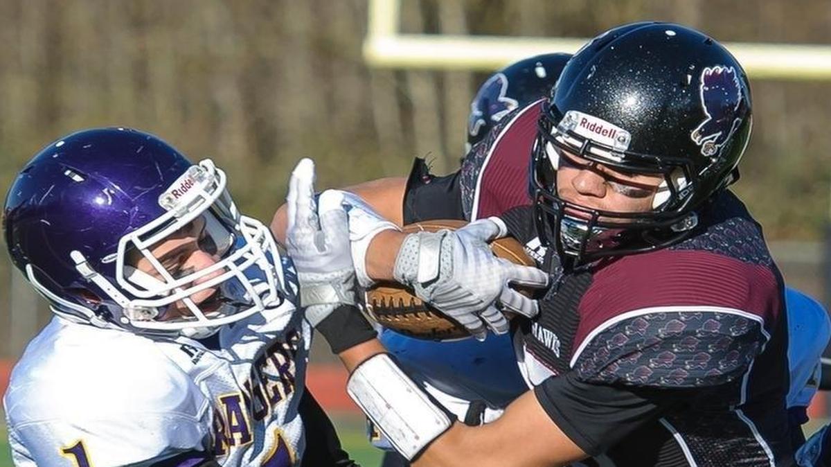 Lummi’s Trazil Lane fights for extra yardage during the 2015 Class 1B state quarterfinals against Quilcene. The Blackhawks host Naselle in this year’s quarterfinals Friday.