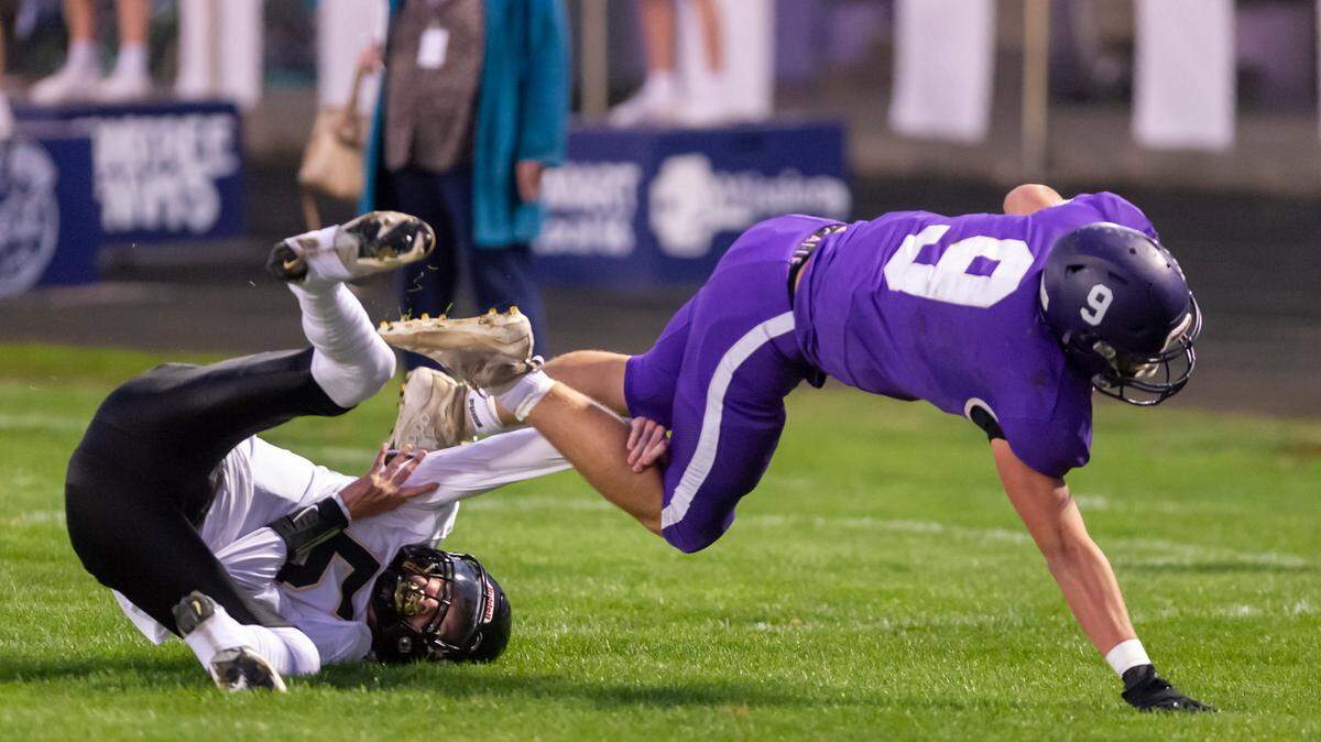 Nooksack Valley running back Colton Lentz (9) dives while attempting a touchdown Friday evening Sept. 30, at Nooksack Valley High School in Everson. No. 3 Nooksack Valley will play No. 10 Mount Baker in the 1A state semifinals. at 1 p.m. Saturday, Nov. 26, at Bellingham’s Civic Stadium.