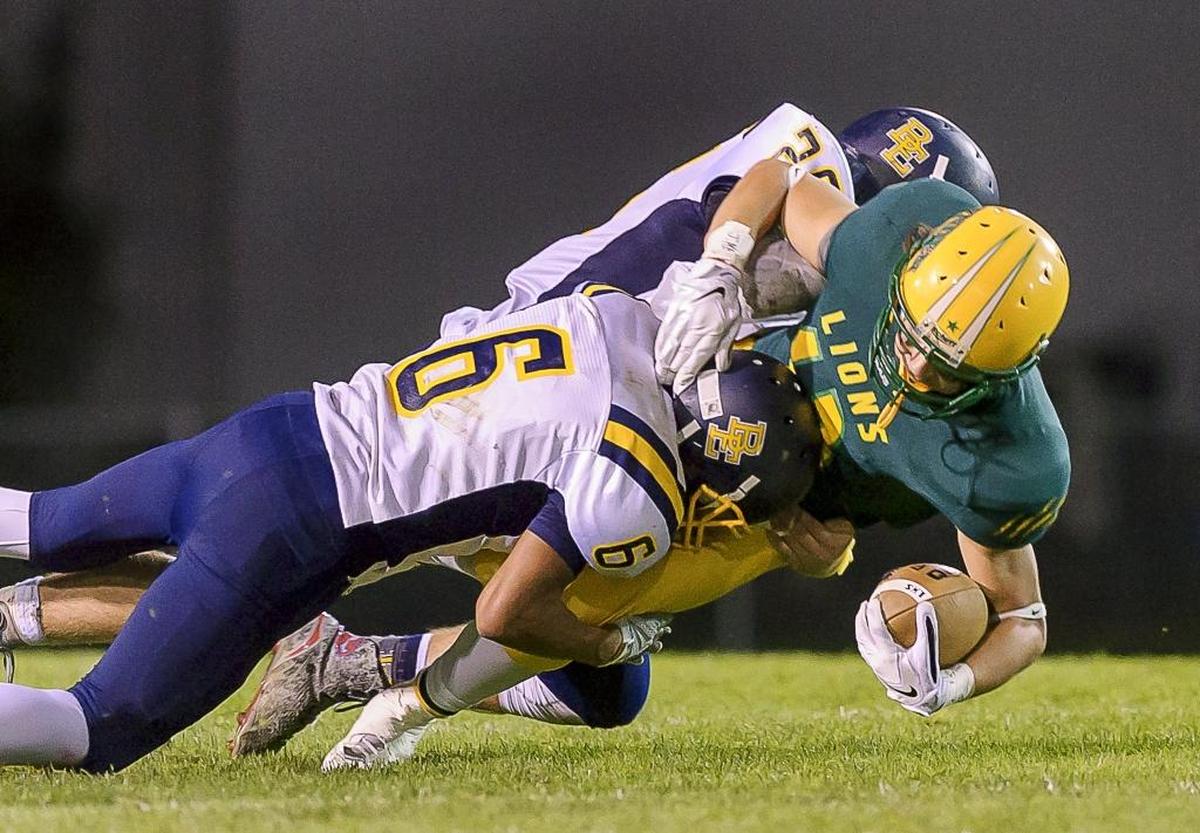 Burlington-Edison’s Derek Cherryholmes (6) and the Tigers face Archbishop Muprhy in a Class 2A Northwest District playoff game on Friday, Nov. 7.