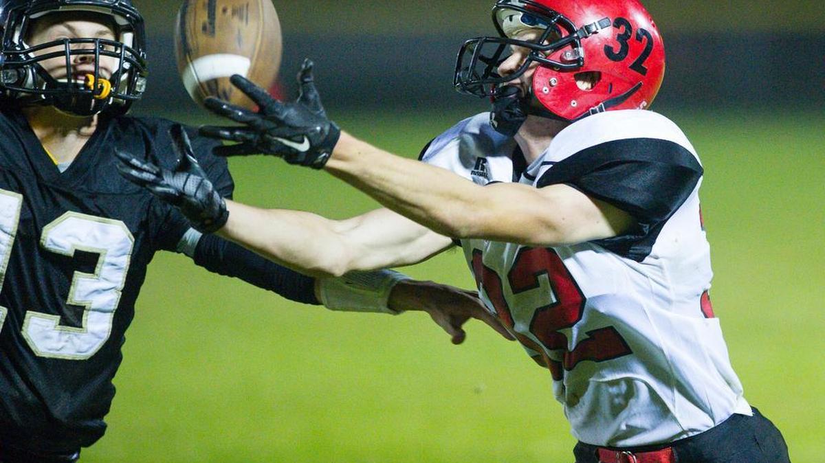 
Mount Baker’s Thomas Barbo brings in a big reception over Meridian’s Simon Burkett on Friday, Oct. 2, at Meridian.
