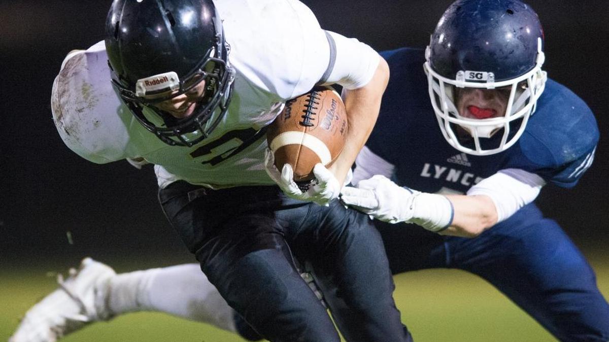 
Meridian’s Marcus McGuinn breaks an attempted tackle by Lynden Christian’s Nate Hielkema on Friday, Sept. 25.
