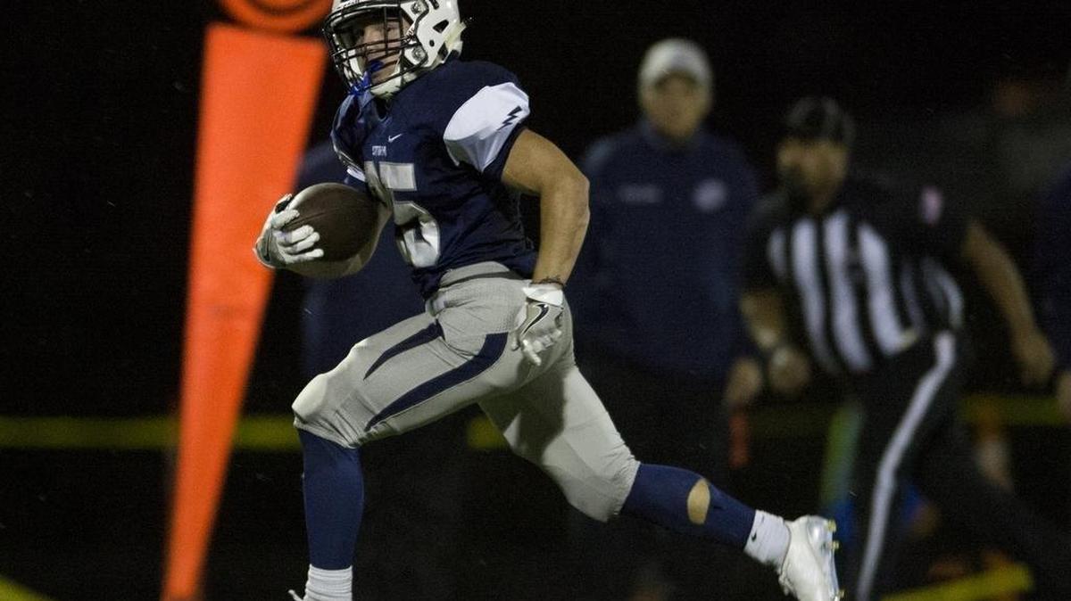 Squalicum’s Triston Smith returns an interception for a touchdown during a victory over Marysville-Pilchuck Sept. 16. Smith was selected WIAA Athlete of the Week after rushing for 445 yards and six touchdowns last week.