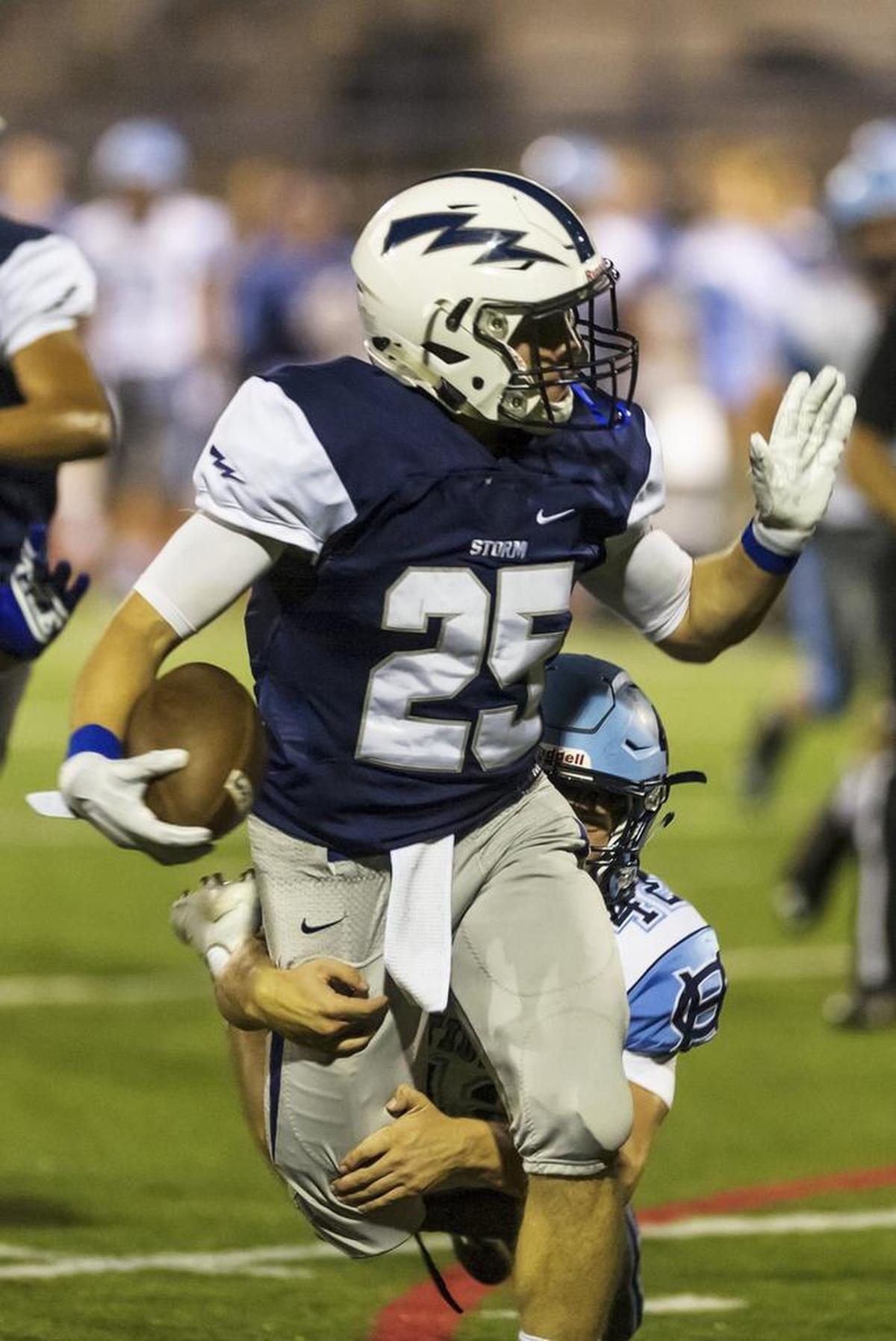 Squalicum’s Triston Smith fights for yardage against Gig Harbor Sept. 1 at Civic Stadium. Smith leads Whatcom County in rushing yardage.