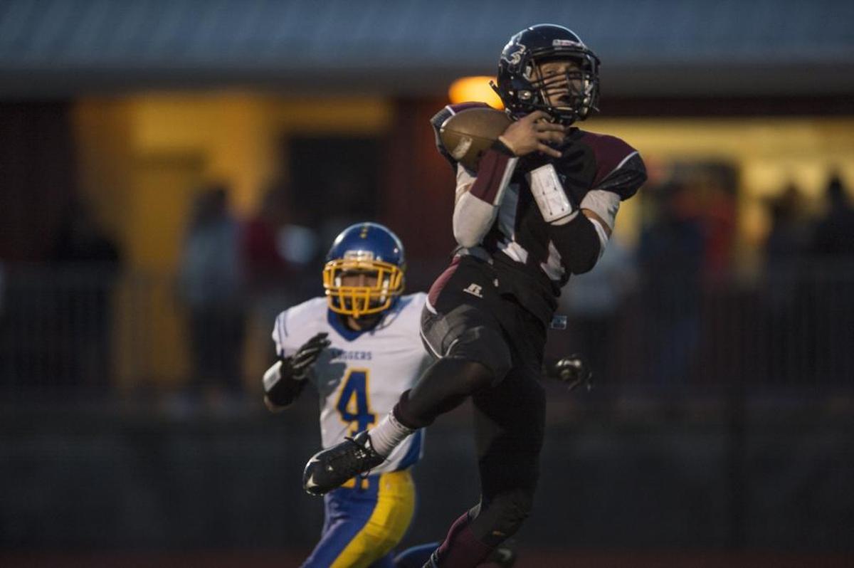 Lummi Nation’s Free Borsey brings in a reception to put the Blackhawks in scoring position during a game against the Crescent Loggers on Friday, Oct. 9.
