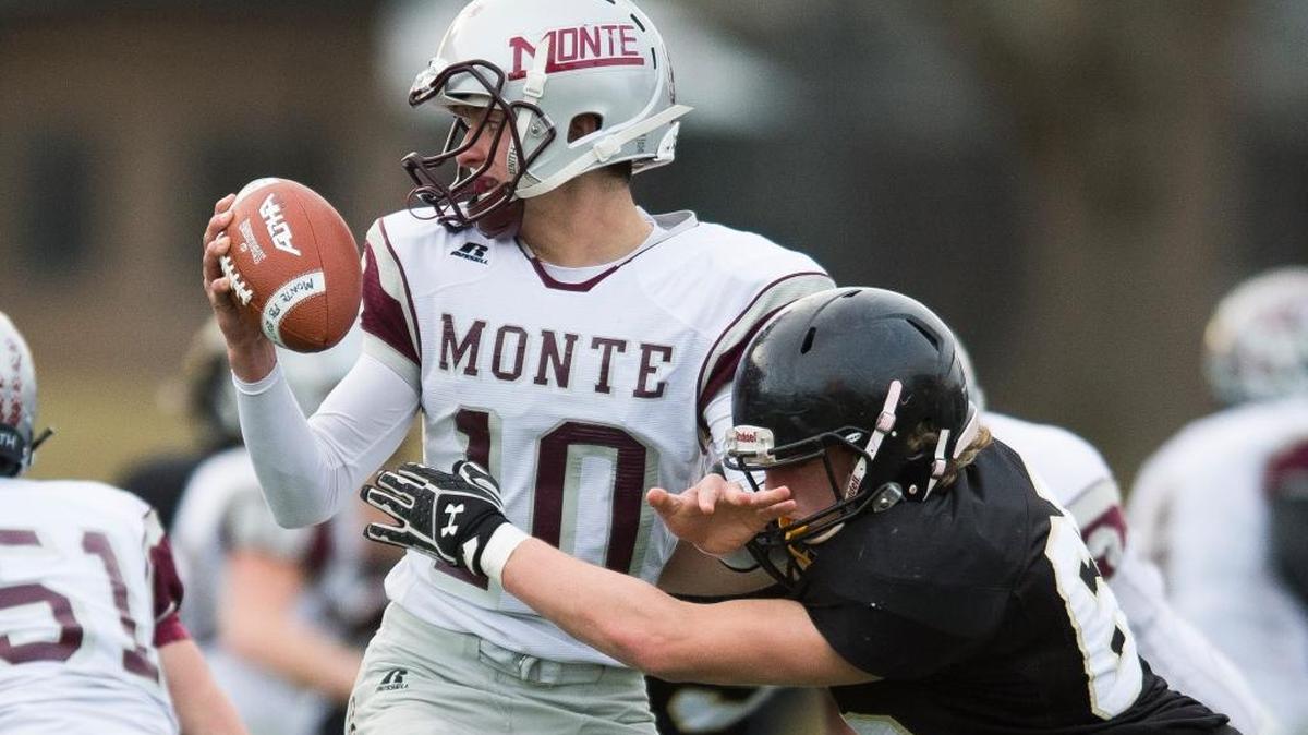 Meridian’s Trevor Pagnossin, right, sacks Montesano’s Trevor Ridgway in the Class 1A state quarterfinals on Saturday, Nov. 18, at Civic Stadium in Bellingham.