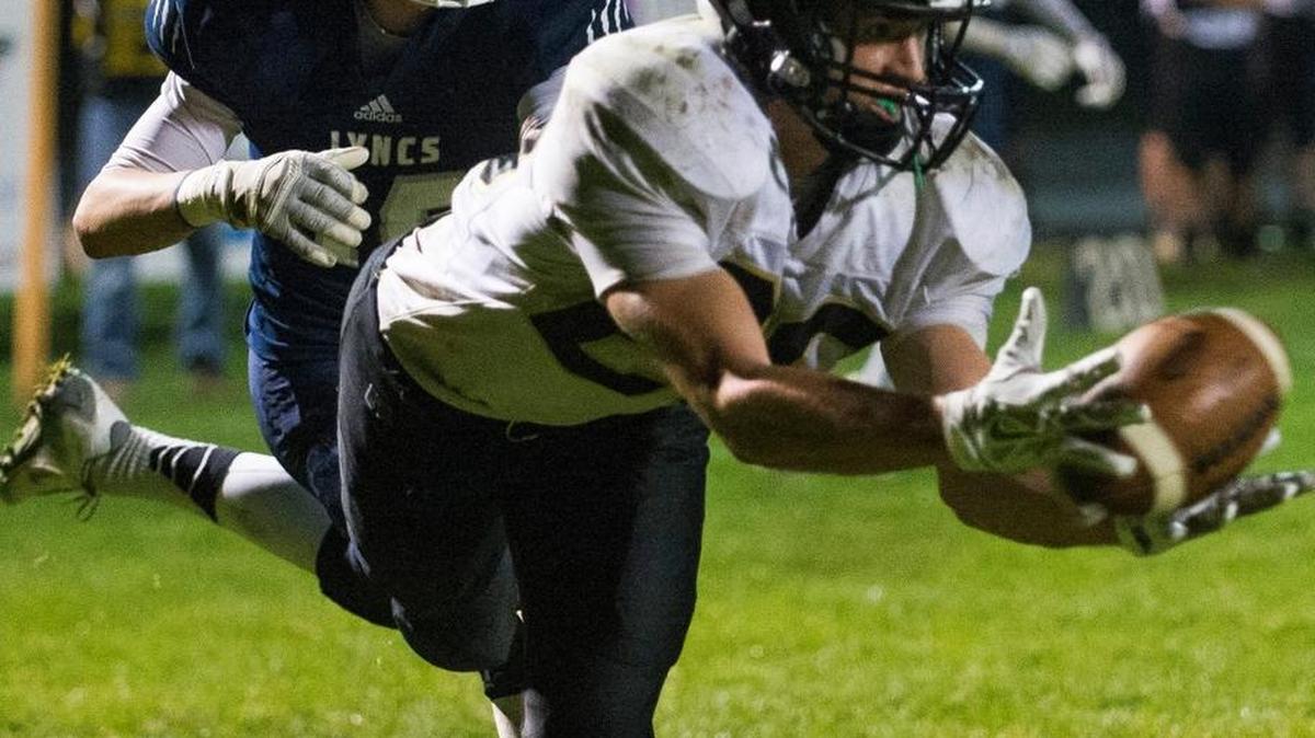Meridian’s Nick Dristas catches a pass for a touchdown on Friday, Sept. 25, at Lynden Christian High School.