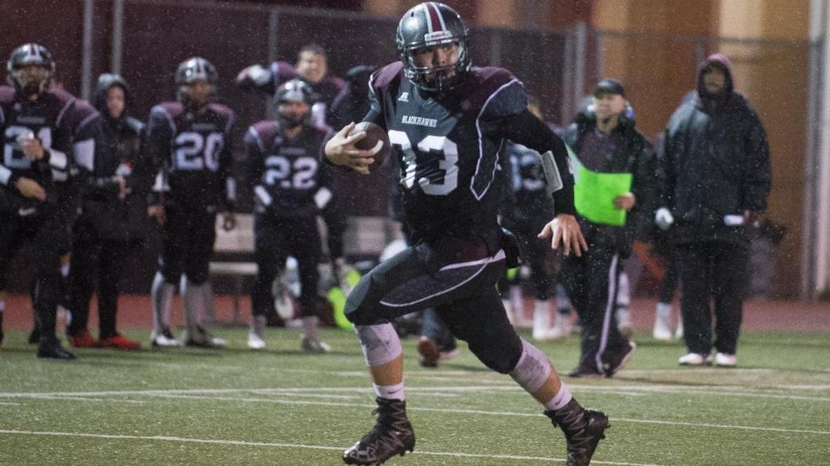 Lummi’s James Williams makes a touchdown reception against Neah Bay during the 1B state semifinals Nov. 26 at Everett Memorial Stadium.