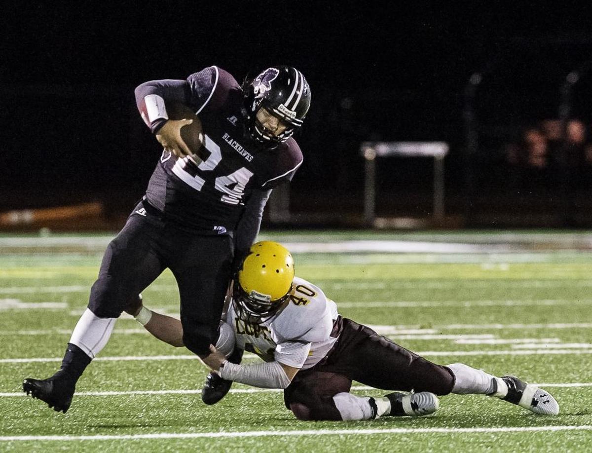 Lummi running back Hank Hoskins (24) and the Blackhawks face Oakville in a Class 1B Quad-District playoff game on Friday, Nov. 7.