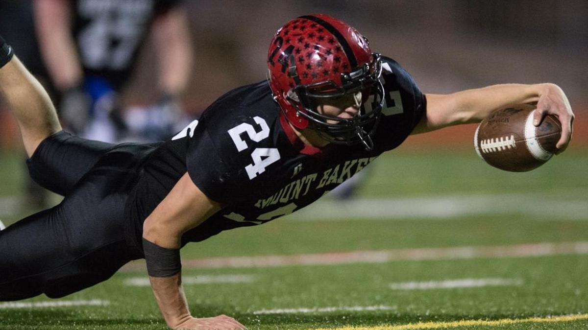 Mount Baker’s Carson Engholm dives for the goal line during a 1A Northwest District playoff game against Sultan Nov. 4 at Civic Stadium in Bellingham.