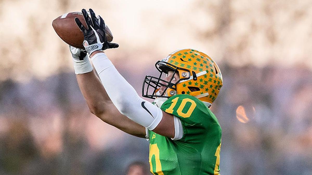Lynden receiver James Marsh catches a short pass in the end zone for a touchdown last week during the 2A state quarterfinals at Civic Field in Bellingham. The Lions beat Fife 31-0 in the semifinals Saturday in Puyallup and are back in the title game for the first time since 2014.