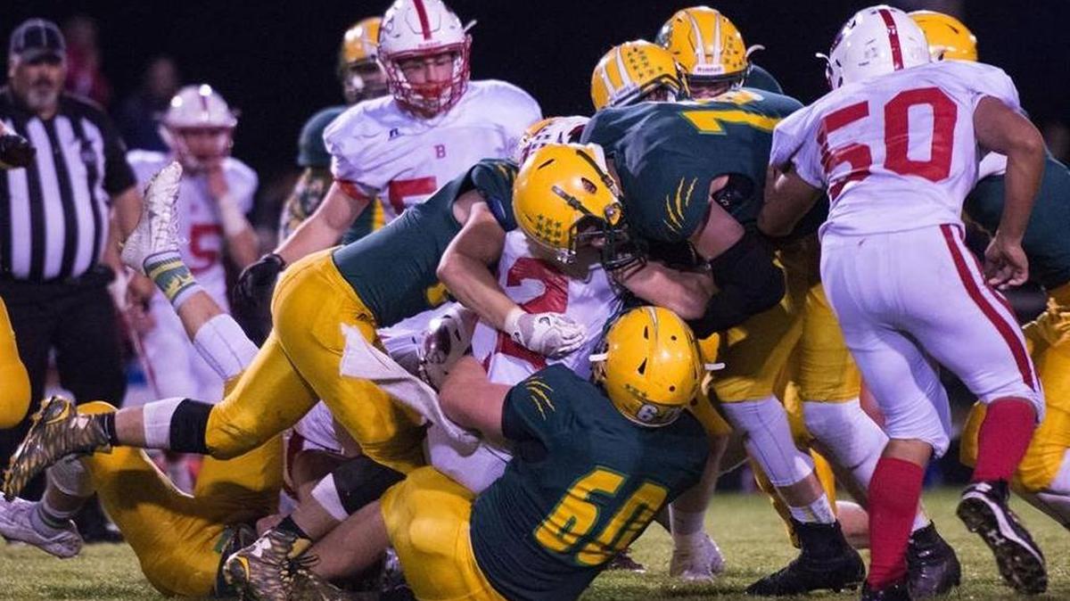 The Lynden defense makes a tackle in a Sept. 16 game against Bellingham.