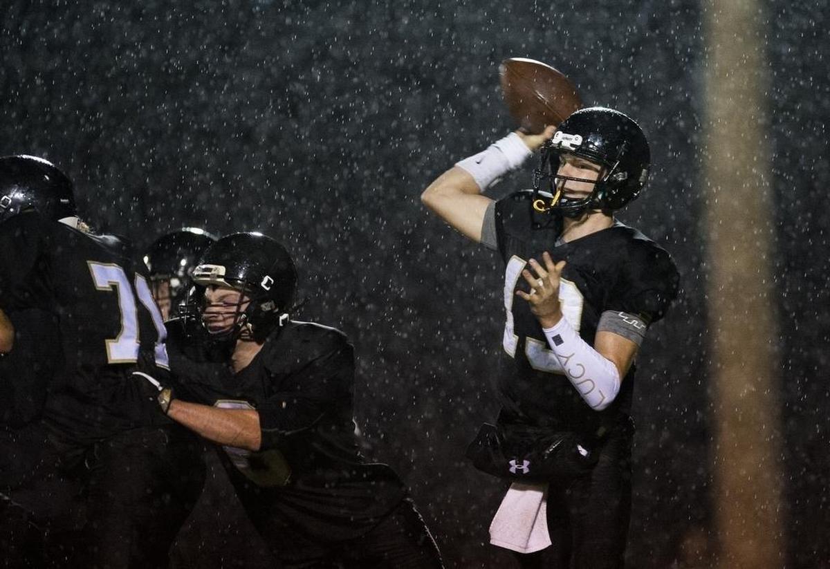 Meridian’s Simon Burkett looks to make a pass against Mount Baker Oct. 6. He leads Whatcom County with 2,693 yards passing this year.