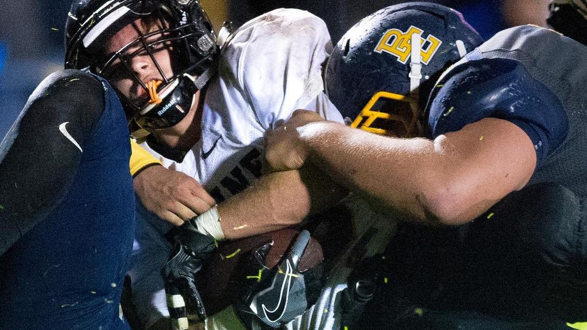 Blaine’s Garrett Adams falls over the goal line for a touchdown against Burlington-Edison on Thursday, Oct. 27. Adams had 54 rushing yards.