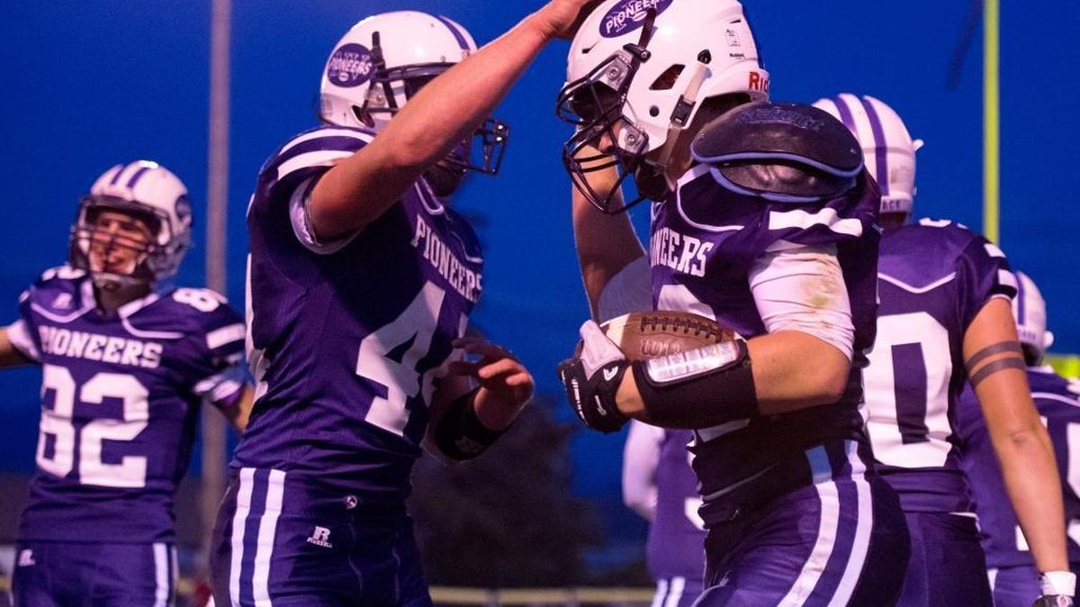 Nooksack Valley celebrate during a 47-34 victory over Meridian Friday, Sept. 30.