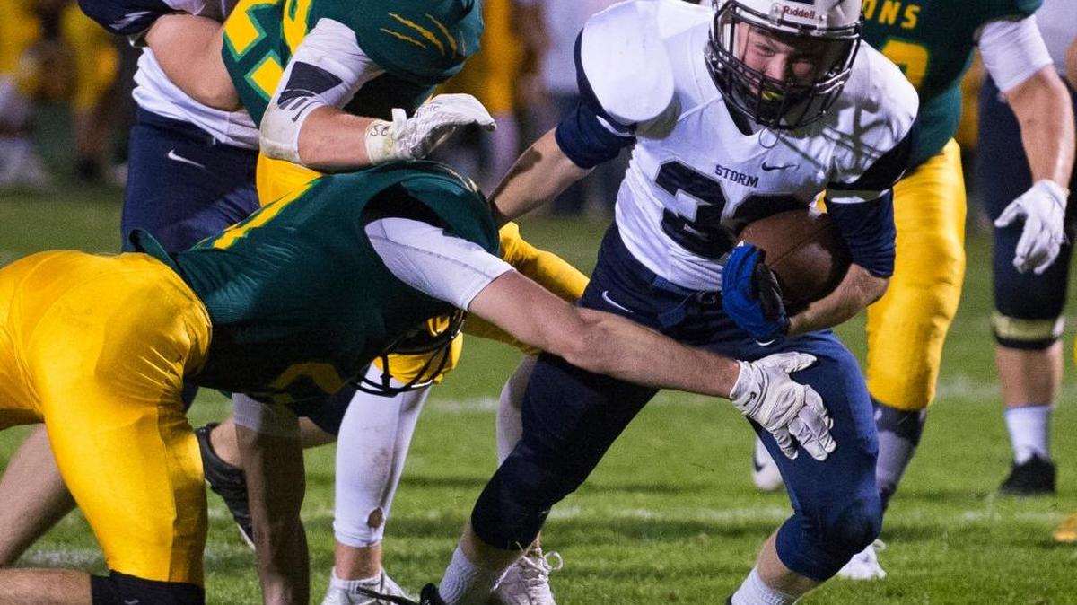 
Squalicum’s Will Nickelson breaks a tackle on his way to a touchdown on Friday, Sept. 18, at Lynden High School in Lynden.
