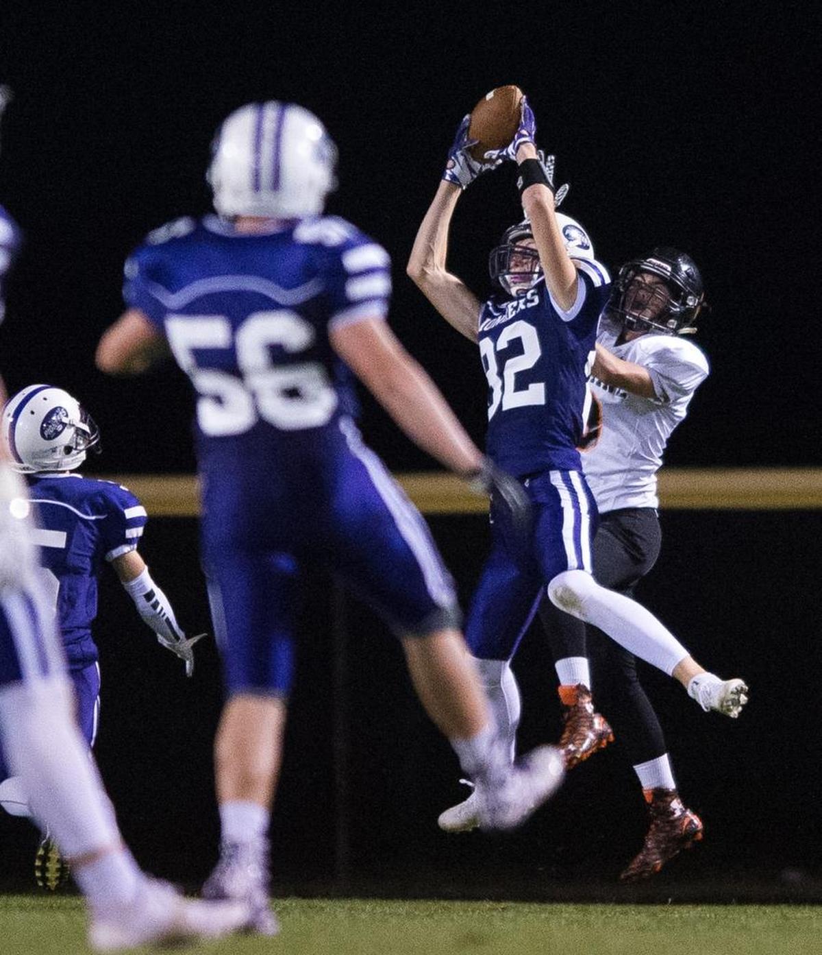 Nooksack Valley’s Jordan Veening intercepts a pass during a 45-6 victory over Blaine on Friday.