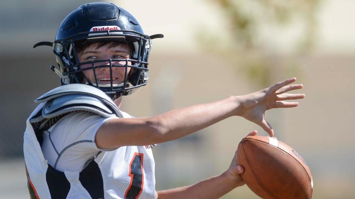 Blaine quarterback Cameron Ellis looks to make a pass during practice Aug. 24.