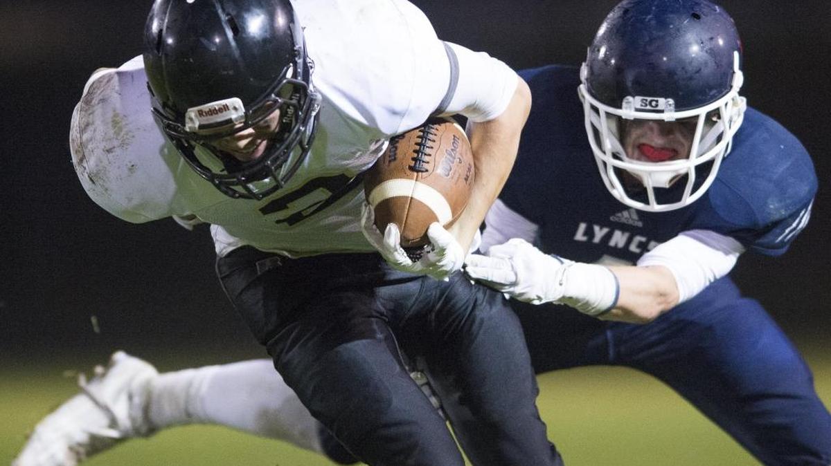 Meridian’s Marcus McGuinn breaks an attempted tackle by Lynden Christian’s Nate Hielkema Sept. 25. McGuinn has committed to play football at the University of Puget Sound.