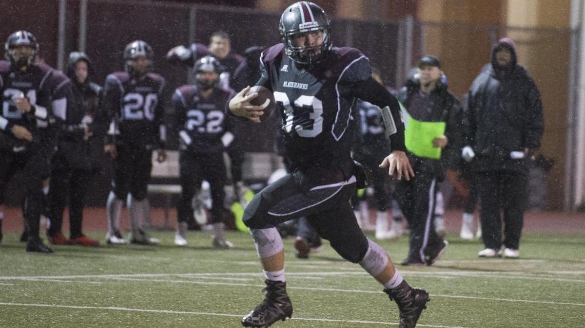 Lummi’s James Williams makes a touchdown reception against Neah Bay Nov. 26 at Everett Memorial Stadium.