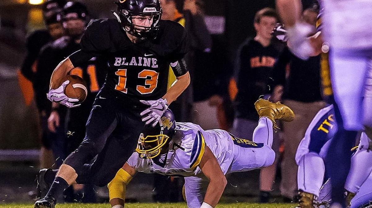 Blaine wide receiver Dalton Mouw a tackle by Burlington-Edison defensive back Brett Rawlins during the second quarter Friday.