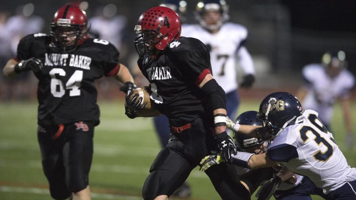 Mount Baker’s Jed Schleimer, center, leads the Northwest Conference with 1,502 yards rushing through the first seven weeks.