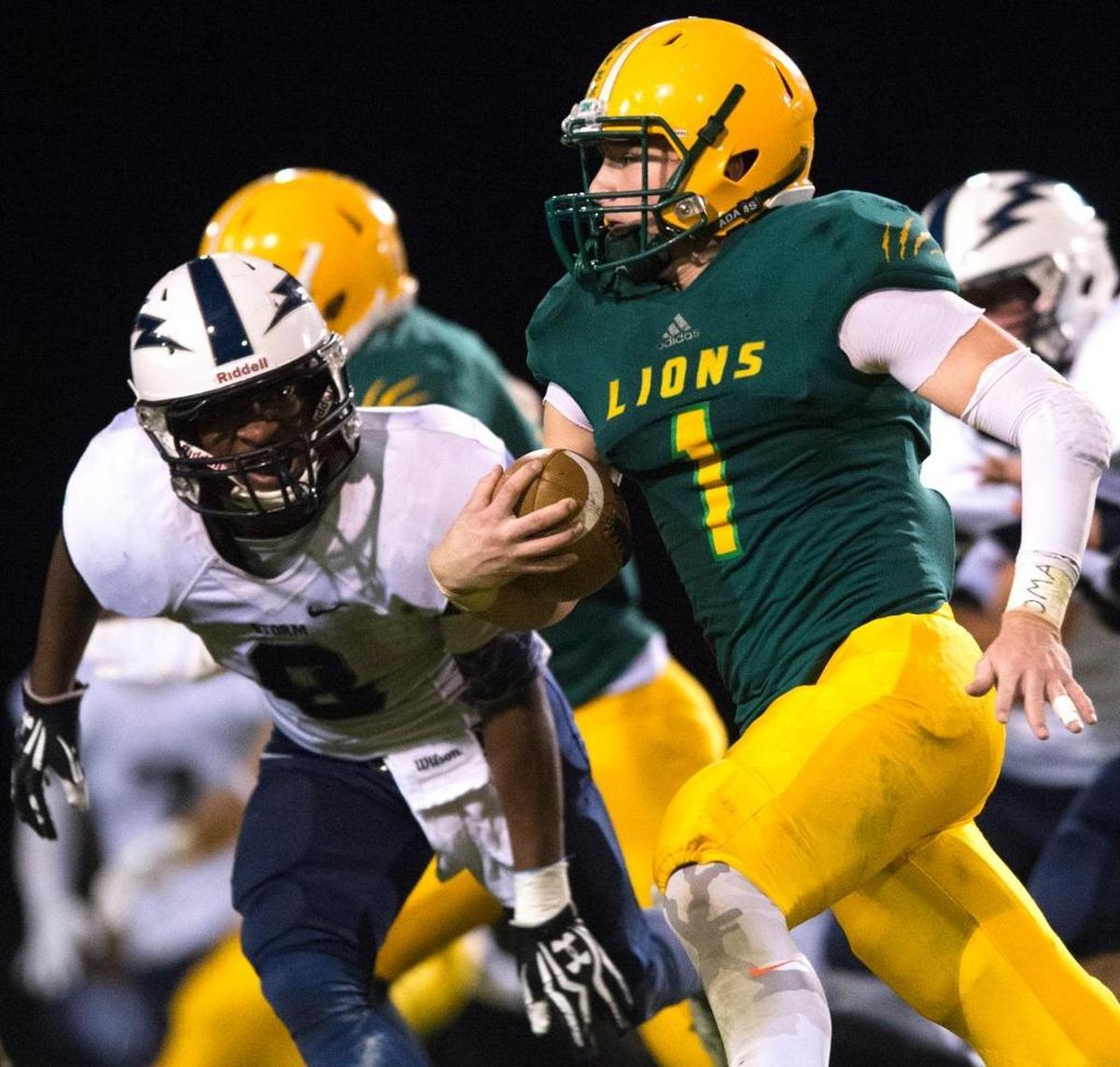 Lynden's Jordan Wittenberg is pursued by Squalicum's Damek Mitchell on Friday, Sept. 18, at Lynden High School. Lynden lost two out of its first three games to open the year, but after winning two straight should be a team to watch the final four weeks of the season.