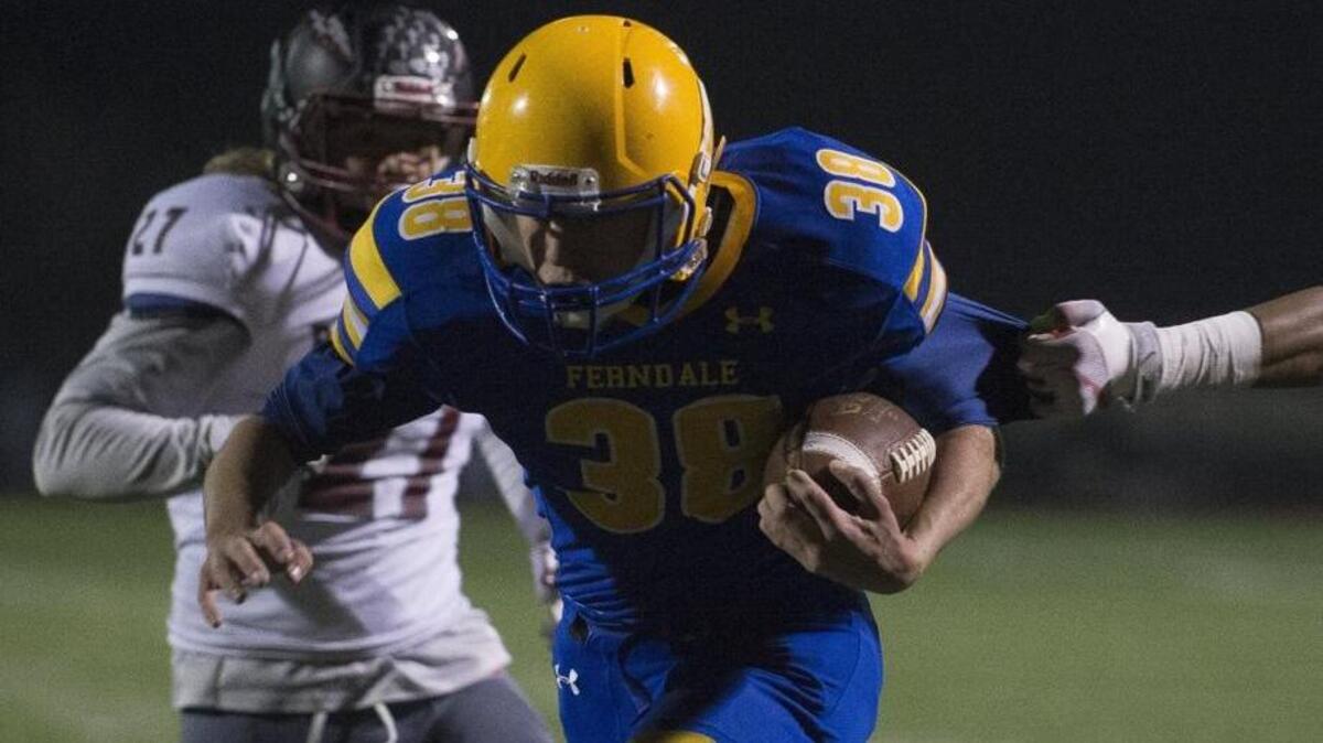 Ferndale’s Bryan Ebe runs into the end zone for a touchdown against Bethel in the first round of the 3A state playoffs on Friday, Nov. 10, at Civic Stadium in Bellingham.
