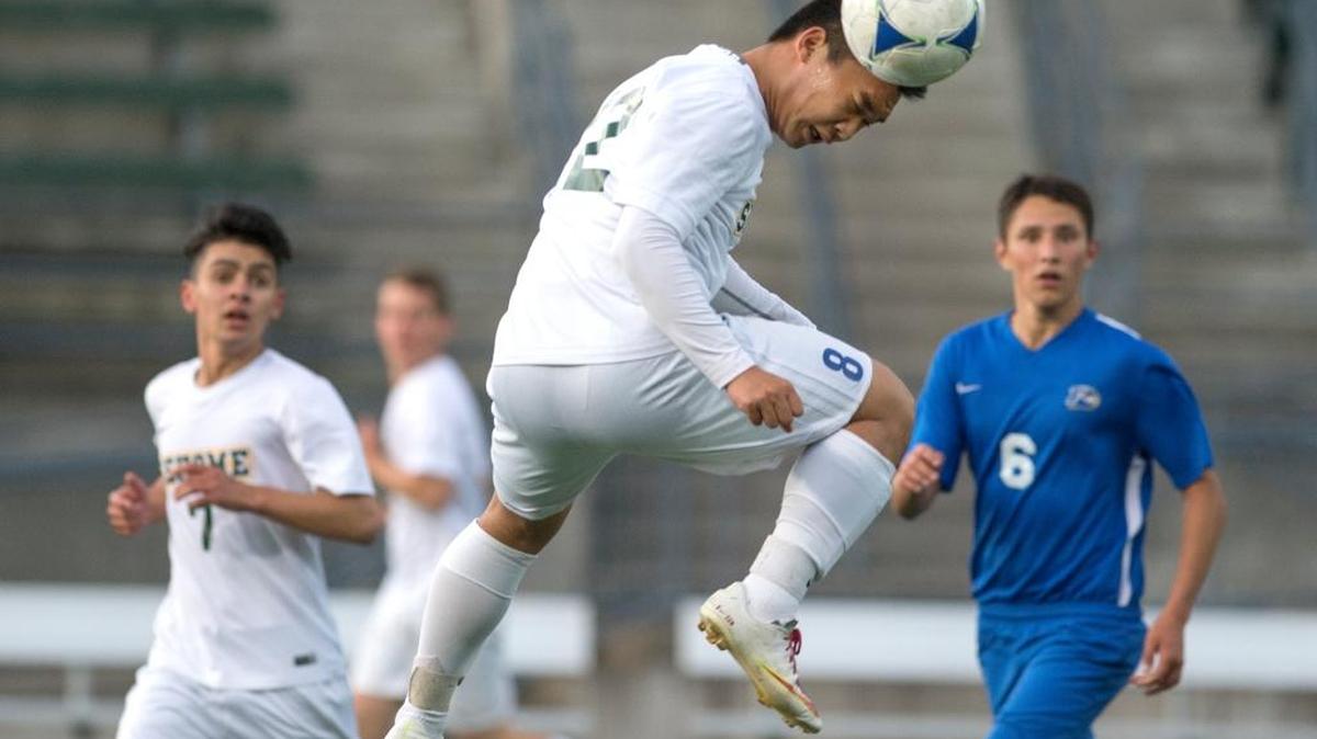Sehome's Kevin Sun heads the ball during a 5-1 victory over Ferndale on Friday, April 29, at Civic Stadium in Bellingham.
