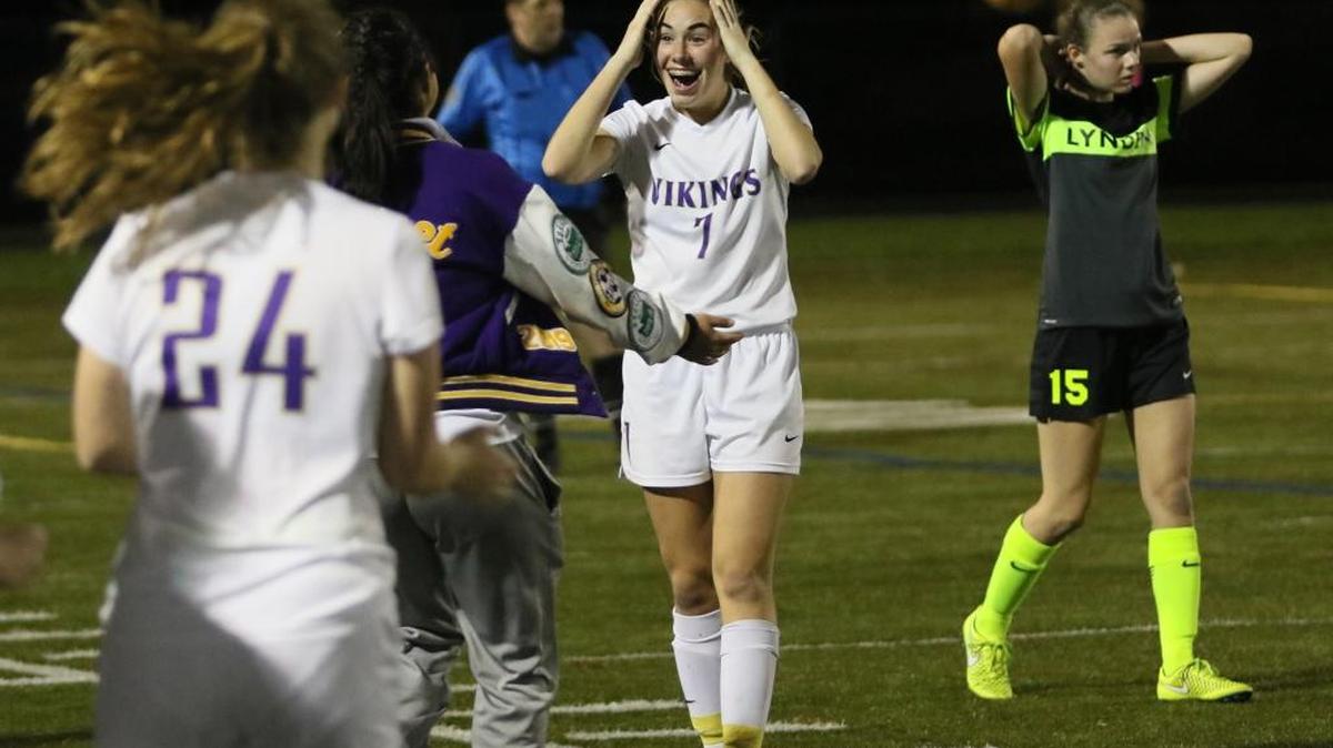 North Kitsap’s Briann George celebrates the Viking’s 1-0 victory over Lynden in the first round of the Class 2A state tournament Tuesday in Poulsbo, Wash.