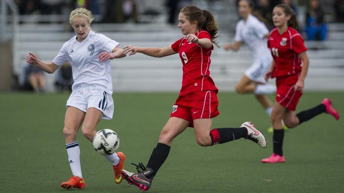 Lynden Christian’s Libby Hielkema battles for possession of the ball with Mount Baker’s Jensen Bertrand during a 2015 Class 1A Northwest District playoff game. Hielkema was selected the offensive MVP on the 2017 All-Northwest Conference team.