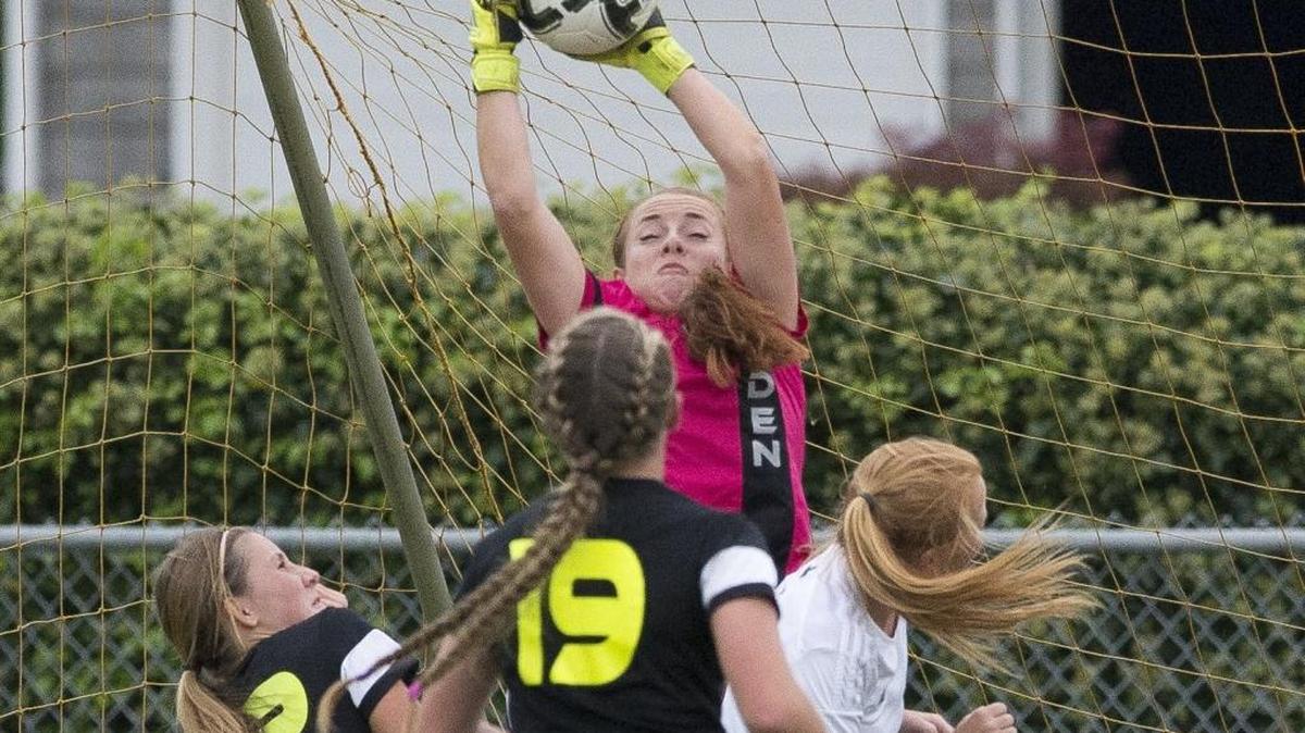 Lynden's Emily Holt makes a save during a victory over Lynden Christian on Thursday, Sept. 24, at Lynden Christian High School in Lynden.