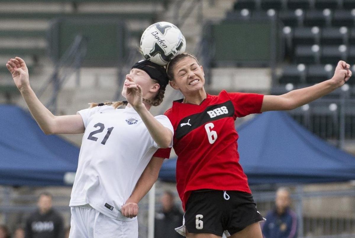 Squalicum's Kendra Steele, left, and Bellingham's Brooke Baker go for a header at the same time on Oct. 31, at Civic Stadium in Bellingham.