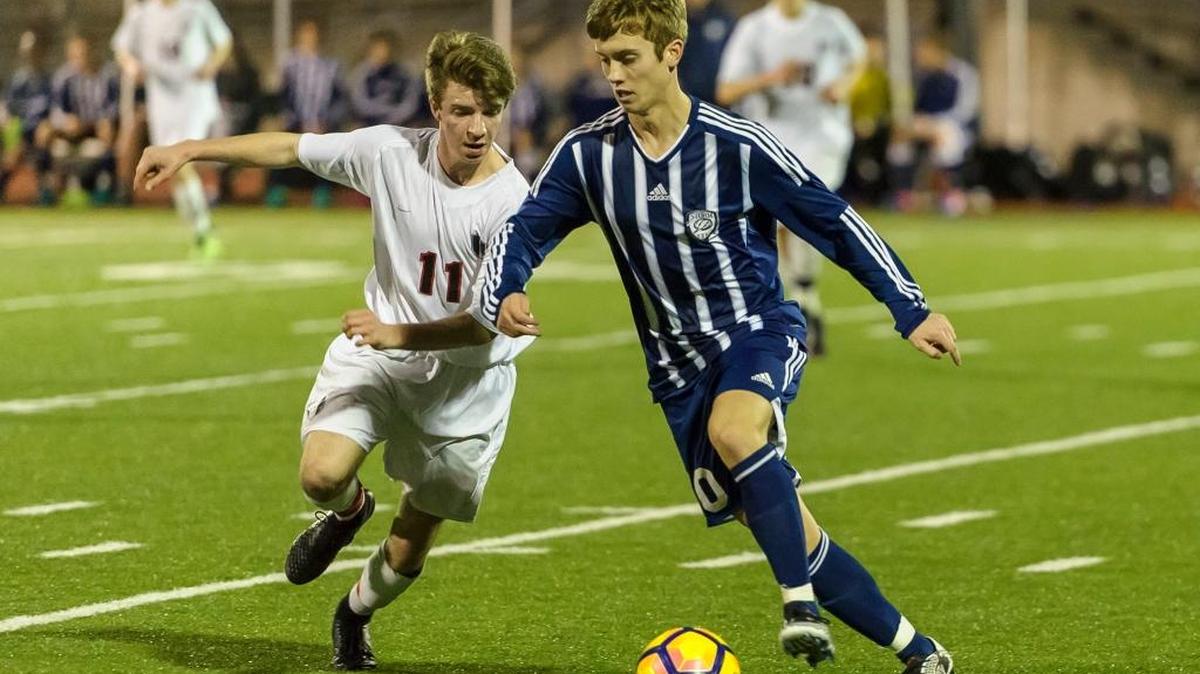 Squalicum’s Tyler Hughes, right, works aganst Bellingham’s Connor Steward during a March 14 match at Civic Stadium in Bellingham. Hughes was named to the Class 3A all-state team selected by coaches.
