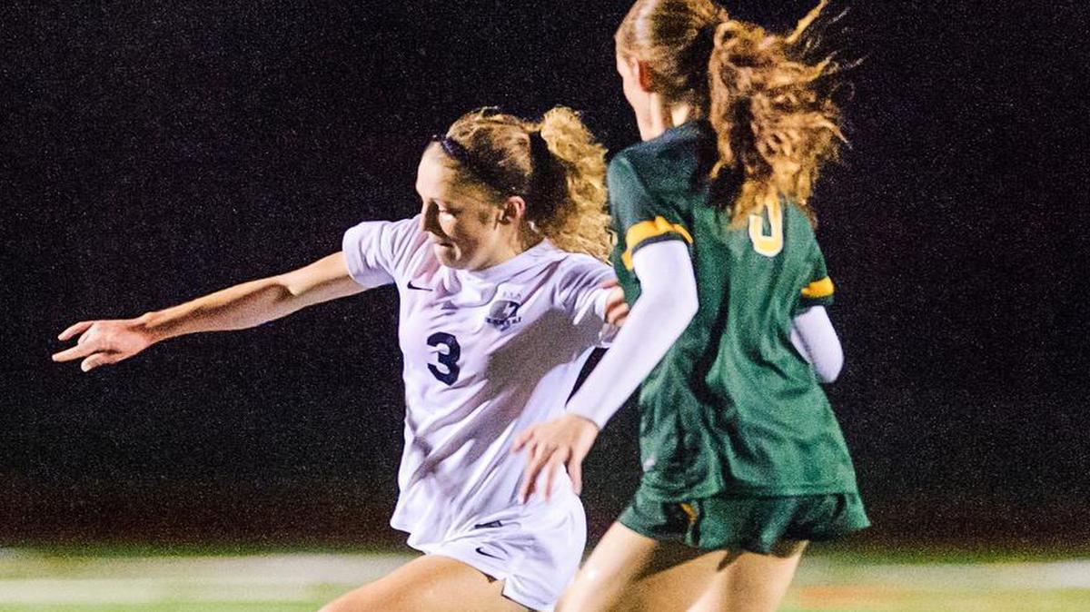 Squalicum’s Kim Hazlett (3) rounds Shorecrest’s Shay Adams (5) to take a shot on goal during the first half Saturday, Nov. 7, at Sedro-Woolley.