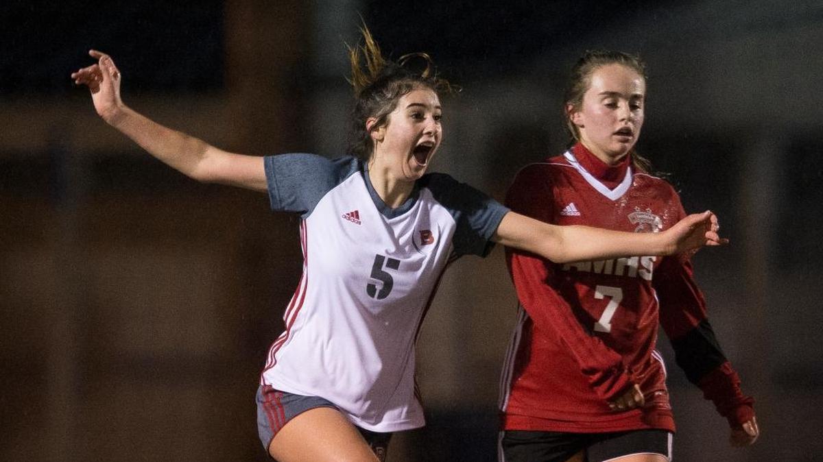 Bellingham's Allison Krell, left, celebrates scoring a goal against Archbishop Murphy on Thursday, Nov. 2, at Sedro-Woolley High School. Bellingham advanced to state with the 5-3 victory.