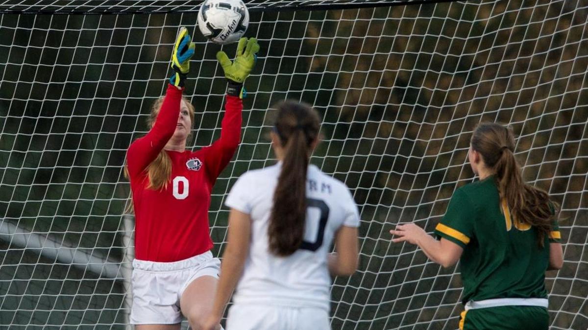 
Squalicum's Rachel Runnalls makes a save during their 2-1 victory over Shorecrest to win the 2A girls soccer state championship on Saturday, Nov. 22, 2014, in Shoreline.
