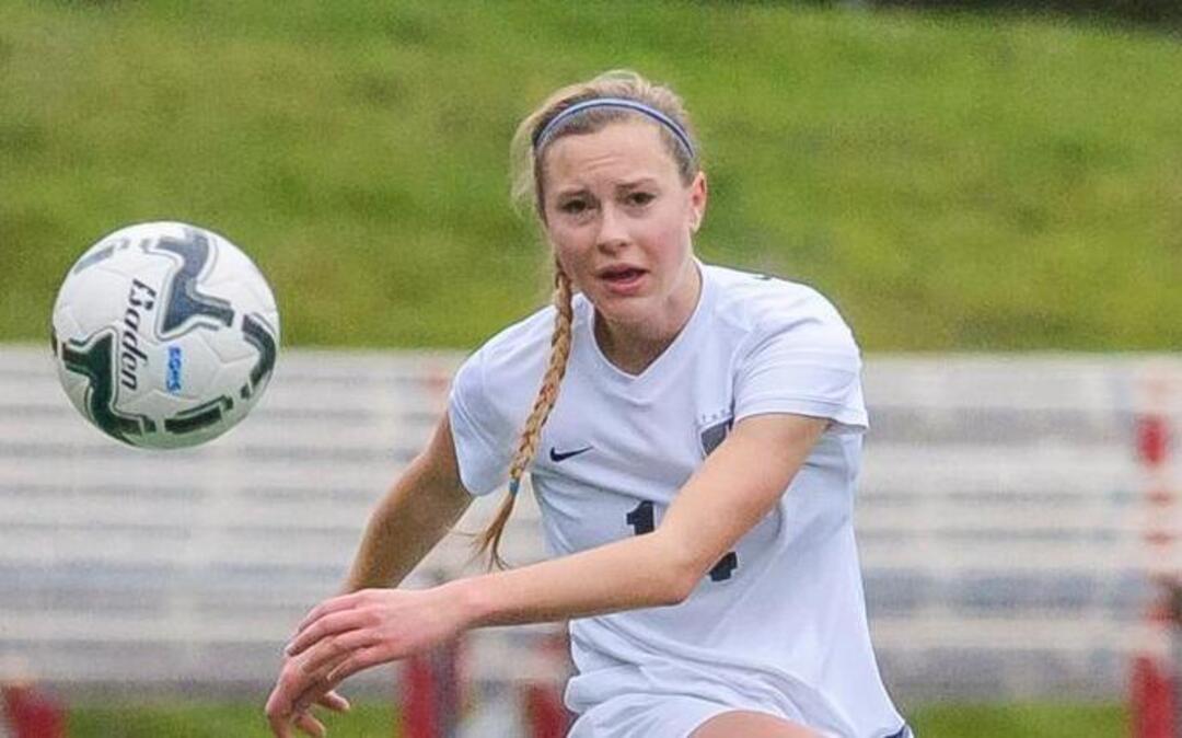 Squalicum’s Rachel Dorr (14) sends a ball forward during the first half of the Class 2A Girls' Soccer State Tournament quarterfinals on Saturday afternoon, Nov. 14, at Civic Stadium in Bellingham.