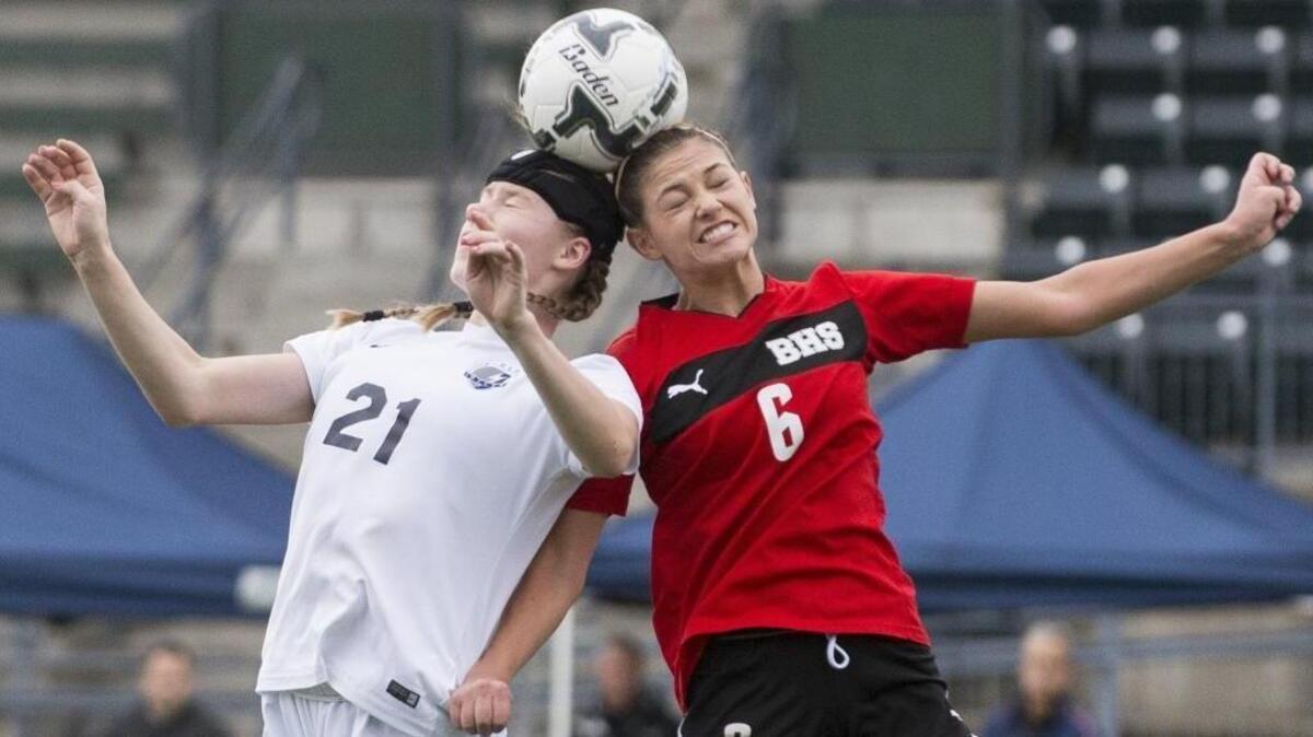 Squalicum’s Kendra Steele, left, and Bellingham’s Brooke Baker go for a header at the same time Oct. 31 at Civic Stadium in Bellingham. Steele returns to a Storm defense that allowed just four goals in 2015.